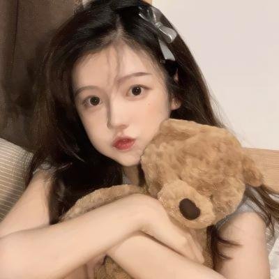 彼女